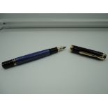 A boxed Pelikan m800 fountain pen, 2008, Black and Blue striated, medium nib, converter, made in