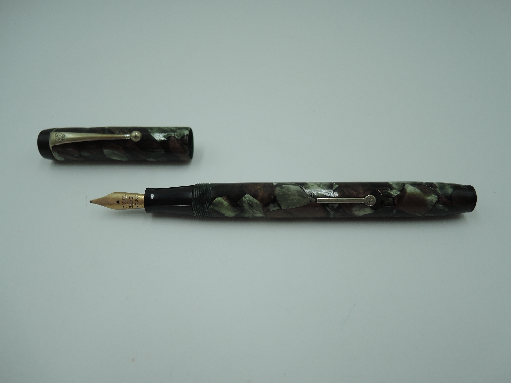 A Conway Stewart 475 fountain pen, circa 1933, in moss agate, medium/braod nib, lever fill,