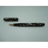 A Conway Stewart 475 fountain pen, circa 1933, in moss agate, medium/braod nib, lever fill,