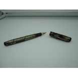 A Mabie Todd & Co Swan fountain pen, circa 1939, Green and Silver snakeskin with back lever, lever