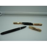 A Parker 51 fountain pen, mechanical pencil and liquid lead pencil set, circa 1956, Forest Green,