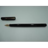A De La Rue Onoto fountain pen , The Pen, circa 1922, in Black Hard Chased Rubberm medium nib, and