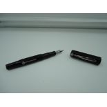 A Hexagonal lever fill fountain pen, circa 1940's, Black, food condition