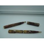 A Waterman Nurse fountain pen and pencil set, circa 1940, Pearl, fine nib, lever fill, good