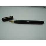 A Ford fountain pen. The Ford Patent Pen, circa 1931, Black Hard Rubber, syringe fill, very good