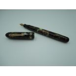 A Conklin Endura Symetrik fountain pen, circa 1930, in moss agate, with medium nib, excellent