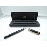 A boxed Parker Duofold fountain pen 1996, Black with gold trim, converter, very good condition, made