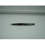 A Sheaffer mechanical pencil, Black and Silver striated, made in the USA
