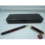A Parker Sonnet fountain pen, 1994, Lacque Red, fine nib, converter, made in France,