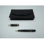 A Conway Stewart Dinkie 526s fountain pen, circa 1931, in Black Hard Chased Rubber two gold bands,