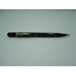 A Conway Stewart Nippy mechanical pencil, circa 1933, green and black marble, made in the UK