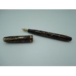 A Conway Stewart 28 fountain pen, circa 1950, tiger eye, medium nib, lever fill, excellent