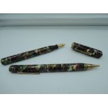 A Welsh Manufacturing Co fountain pen and pencil set, Multi couloured marble, fine/ medium nib,