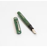 A Sheaffer fountain pen. The Sheaffer Lifetime lever fill fountain pen in bright green jade. Circa