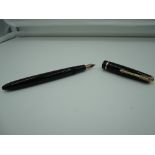 A Parker Slimfold fountain pen, circa 1960, Black Gloss with gold trim, medium nib, aeromatic,