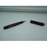 A Wahl Eversharp Signature fountain pen, 1930, Rosewood ringtop, medium nib, lever fill, good