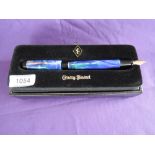 A boxed Conway Stewart Coronet fountain pen, 2010, in Green Whirl, medium nib, converter, limited