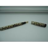 A Stephens 106 fountain pen, 1949, Black and Pearl, medium nib, lever fill, good condition, made