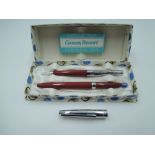 A boxed Conway Stewart fountain pen and pencil set, in red and chrome, cartridge, excellent