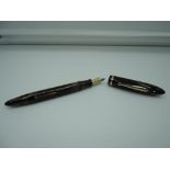A Sheaffer Balance Lifetime Senior fountain pen, 1937, Golden Brown striated, fine nib, lever