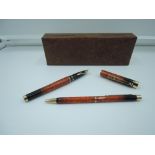 A boxed Sheaffer Targa Classic fountain pen and ballpoint pen set, 1988, Amber Ronce Lacque (AKA