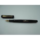 A Crookes fountain pen, circa 1920, black chased, medium nib, lever fill, very good condition,