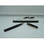 A boxed Osmiroid calligraphy set, black with gold trim