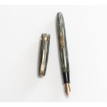 A Waterman fountain pen. A Waterman W5 lever fill fountain pen in opalescent grey and green.