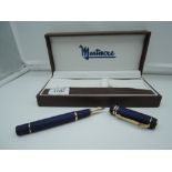 A boxed Mentmore Fountain pen, Matt Blue with gold trim, fine nib, lever fill, in good condition,