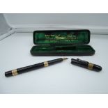 A boxed Mabie Todd & Bard fountain pen, circa 1900, Black Chased Hard Rubber with two 18ct bands,