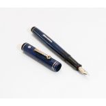 A Wahl-Eversharp lever fill fountain pen. The Gold seal in Lapis Lazuli blue, with the rollerball