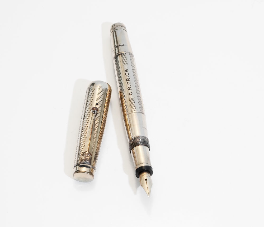 A Mabie Todd Swan fountain pen. A Mabie Todd Swan leverless fountain pen with rolled gold overlay (