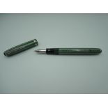 An Esterbrook J fountain pen, Green pearlesent, medium 2556 nib, lever fill, made in the USA