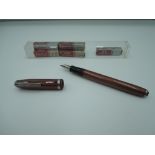 An Esterbrook J fountain pen, circa 1950, Toffee Brown Pearlescent, medium nib, lever fill,