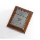 A De La Rue travelling inkwell, the Ransome's Patent. In a wood frame