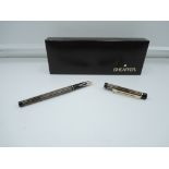 A boxed Sheaffer Targa Slim fountain pen, Black and Gold striped, aeromatic, very good condition