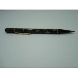 A Conway Stewart Nippy mechanical pencil, in black and green marble, poor condition