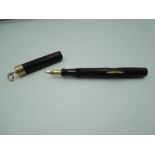 A Conklin Crecent filler fountain pen, circa 1917 Black Hard Chased Rubber, ring top, very good