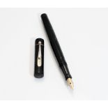 A Mabie Todd Swan fountain pen. A Mabie Todd Swan leverless fountain pen in black wave pattern.
