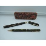 A boxed Waterman 92 fountain pen and pencil set, Green Bronze marble, broad nib, lever fill, very