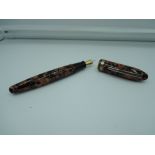 A Laban fountain pen, orange marble, cartridge, good condition