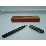 A Green, Grey and Silver marble fountain pen, button fill with a Blackbird nib, good condition