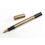 A Waterman fountain pen. A Waterman 42 Safety fountain pen, with retractable nib, overlaid in Rose