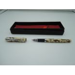 A boxed Duke fountain pen, Ivory and Black snakeskin, medium nib, converter, made in China
