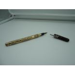 A Mabie Todd & Co Gold Overlayed fountain pen with plain cap, circa 1906, eyedropper, good