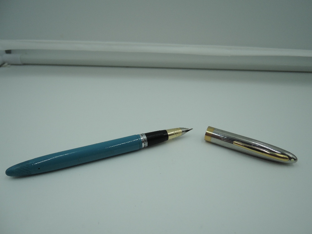 A Sheaffer Sentinel fountain pen, 1955, Peacock Blue, medium nib, snorkel fill, very good condition,