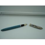 A Sheaffer Sentinel fountain pen, 1955, Peacock Blue, medium nib, snorkel fill, very good condition,