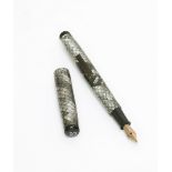 A Mabie Todd Swan fountain pen. A Mabie Todd Swan ladies self-filler fountain pen, in grey snakeskin
