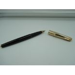 A Parker fountain pen, Black with rolled gold cap, aeromatic, good condition