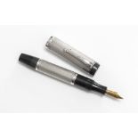A Parker fountain pen. A Parker Slimlined Duofold Junior in black with a jeweller made sterling